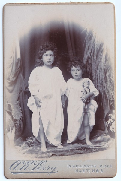 Cabinet Card: Cabinet Card: Children with Doll. A.R. Perry, Hastings.: catalogue image 1