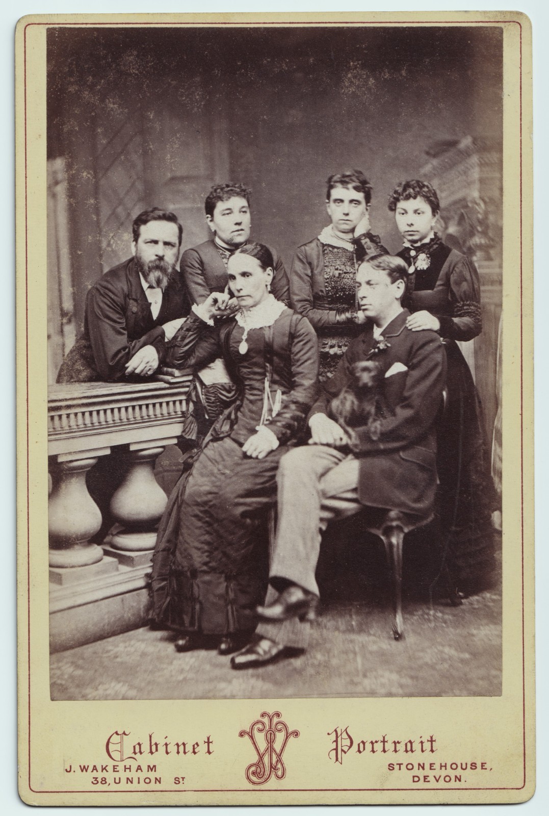 Cabinet Card: Cabinet Card: J . Wakeham, Devon. Family or Group of Friends. Men, Women, Dog.: catalogue image 1