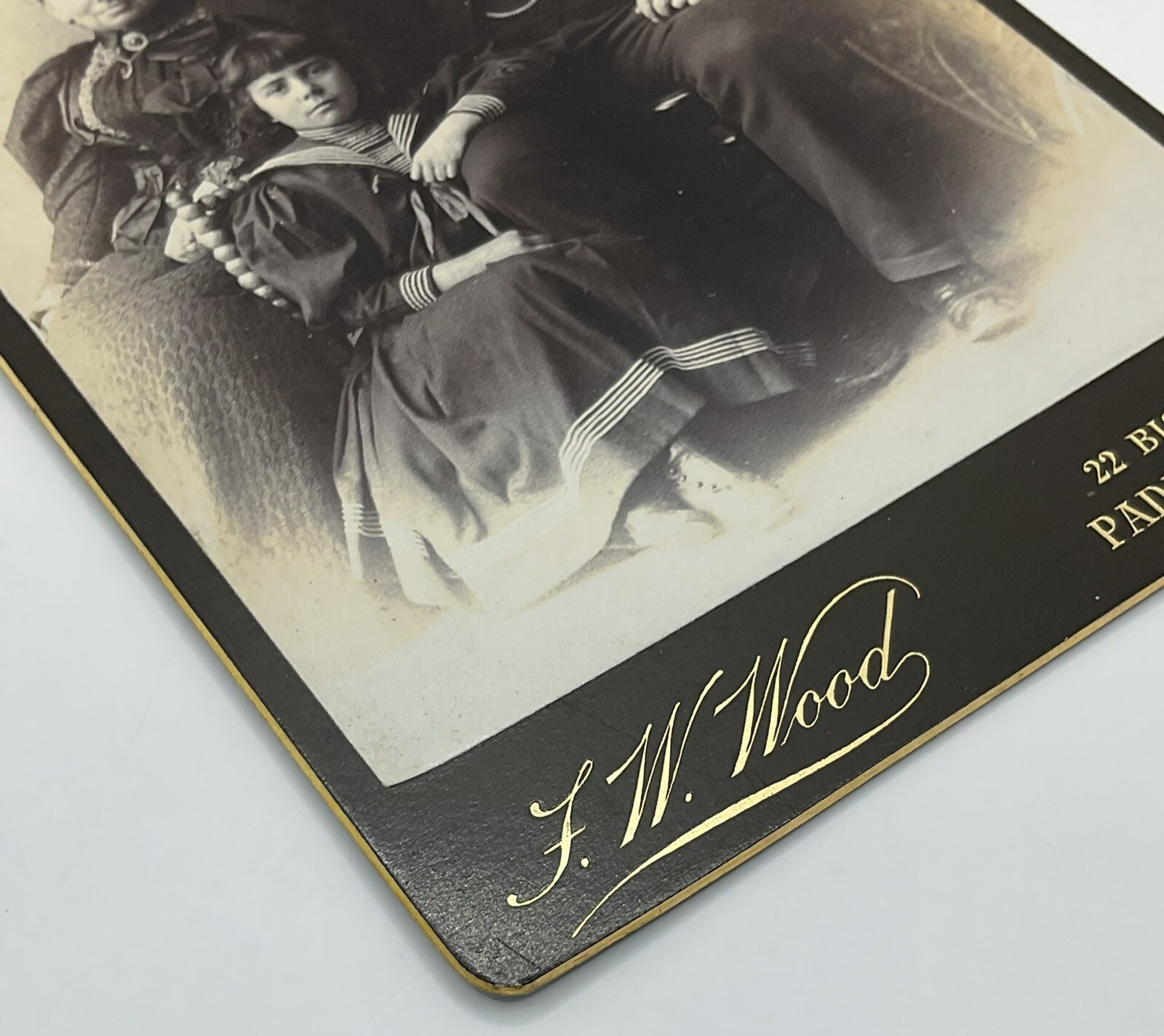 Cabinet Card: Cabinet Card: Man, Woman, and Children, Family Portrait. F W Wood, Paddington: catalogue image 2