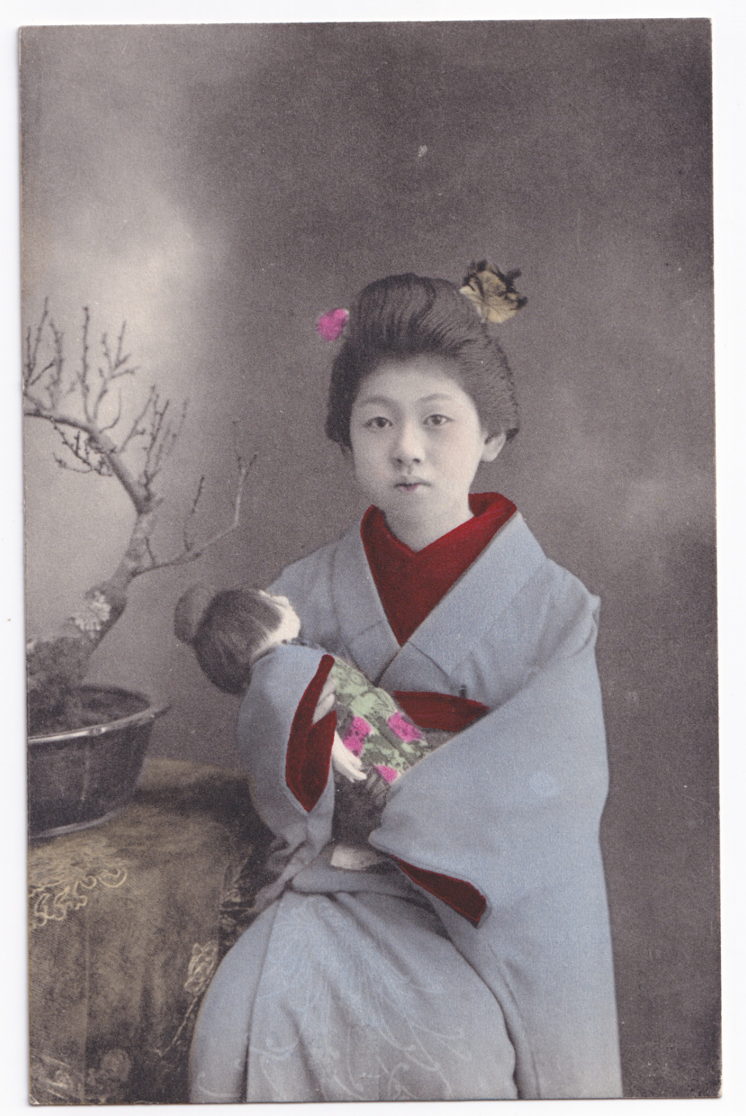 Postcard: Postcard, Japanese Female Holding A Doll, Hand Tinted.: catalogue image 1
