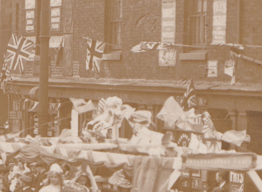 Postcard: Postcard, Unidentified Busy Procession Through Street. Real Photograph.: catalogue image 4