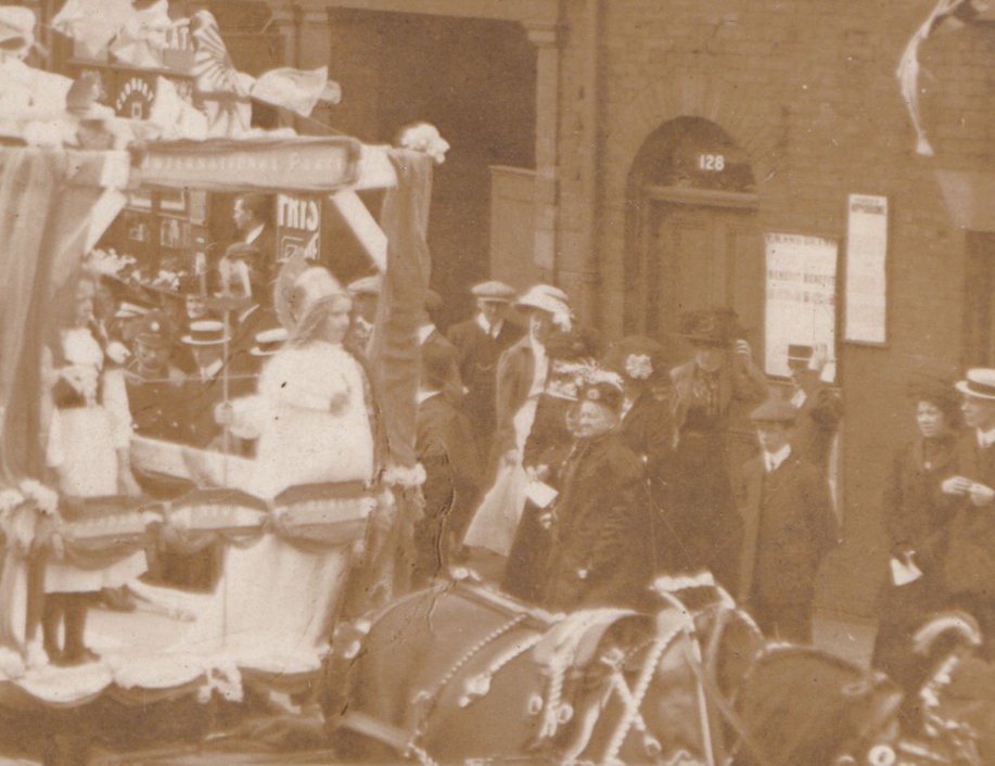 Postcard: Postcard, Unidentified Busy Procession Through Street. Real Photograph.: catalogue image 5