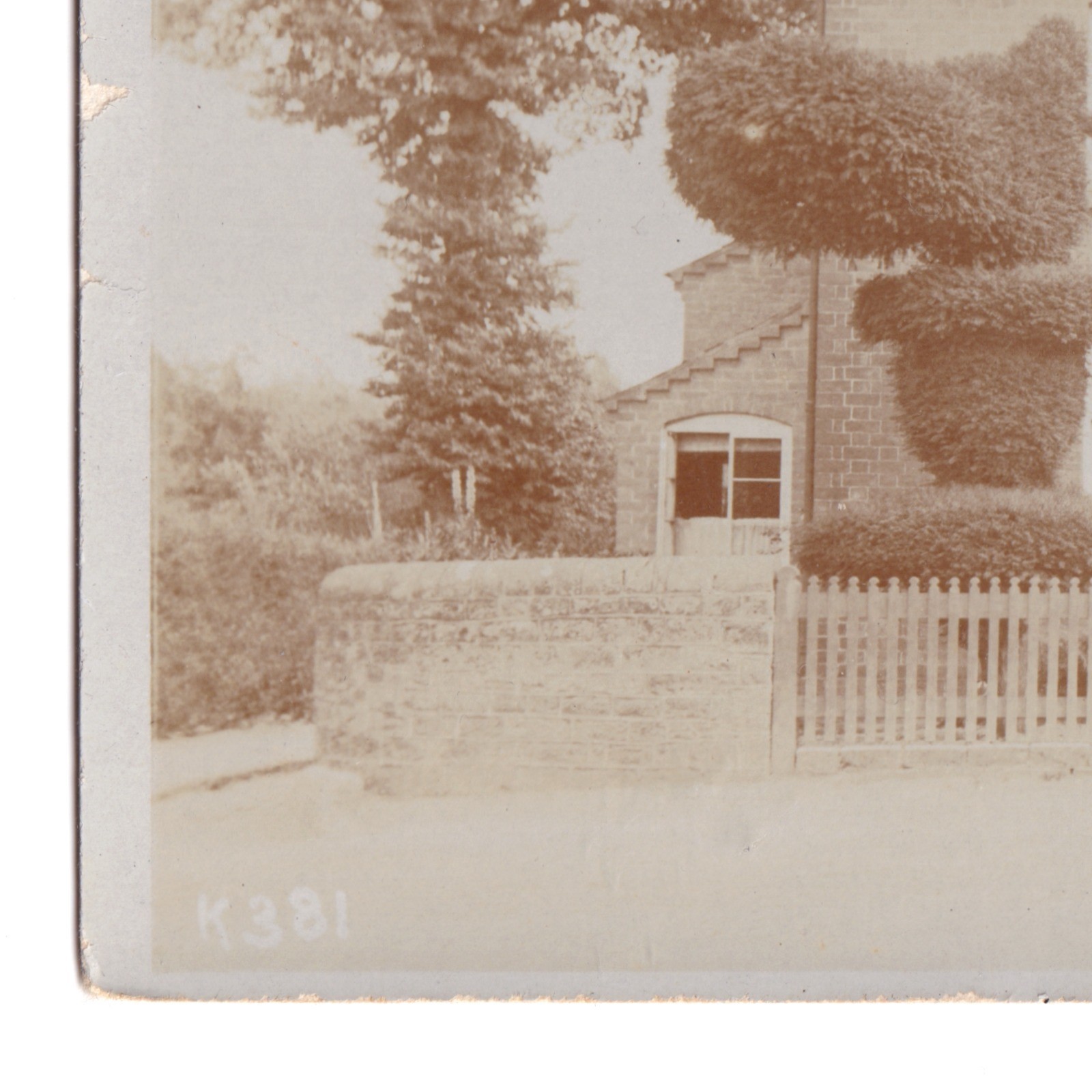 Postcard: Postcard Unidentified House, Family. Distinctive Topiary Bushes, Cross in Window: catalogue image 11