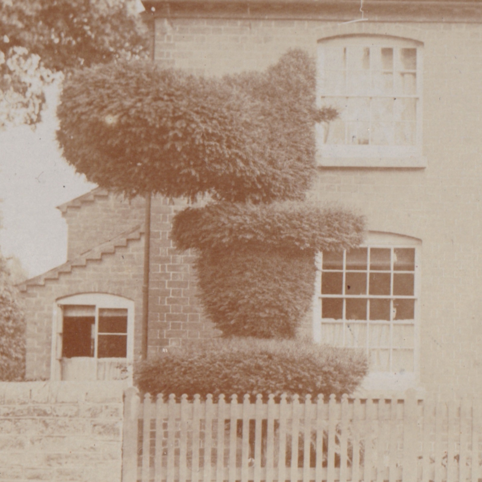 Postcard: Postcard Unidentified House, Family. Distinctive Topiary Bushes, Cross in Window: catalogue image 6