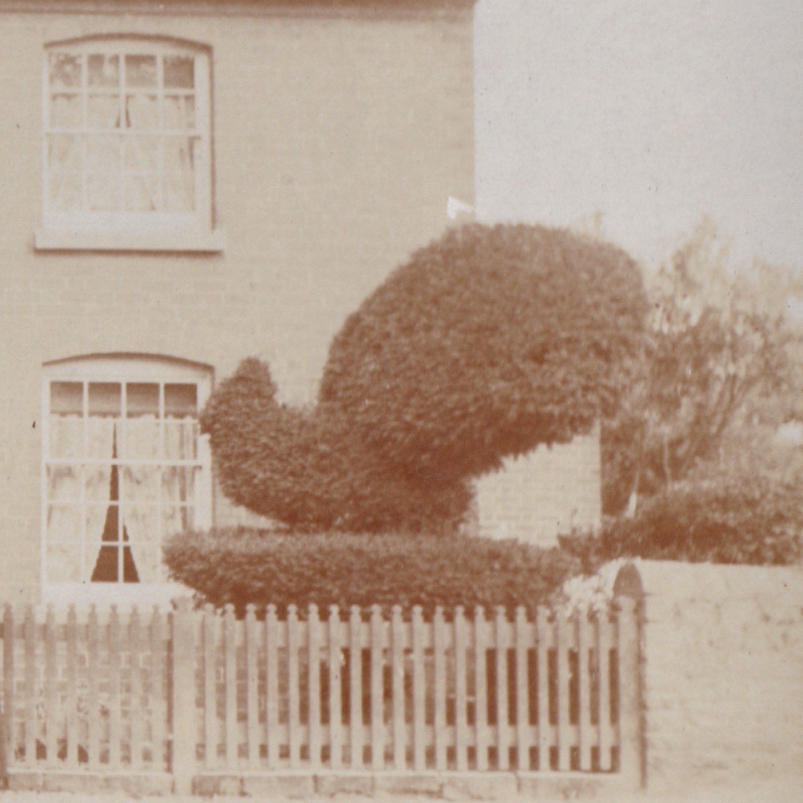 Postcard: Postcard Unidentified House, Family. Distinctive Topiary Bushes, Cross in Window: catalogue image 7